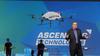 Intel CEO Brian Krzanich with drones floating around during CES 2015 keynote