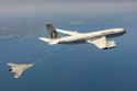The U.S. Navy's unmanned X-47B receives fuel from an Omega K-707 tanker while operating in the Atlantic Test Ranges over the Chesapeake Bay. This test marked the first time an unmanned aircraft refueled in flight