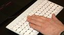 Microsoft Research has developed a prototype keyboard that understands basic gestures. It appears to bridge the gap between an all touch interface and a traditional keyboard. 