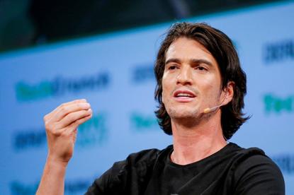 Adam Neumann, CEO of WeWork, speaks to guests during the TechCrunch Disrupt event in May 2017