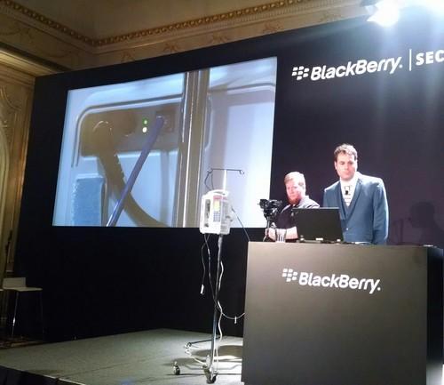 BlackBerry researcher Graham Murphy shows how to hack into an infusion pump, during a demonstration at the BlackBerry Security Summit, July 23, 2015.   
