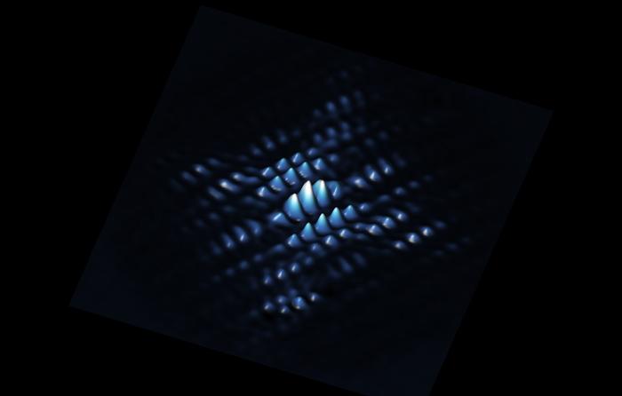 A scanning tunnelling microscope image showing the electron wave function of a qubit made from a phosphorus atom precisely positioned in silicon. Credit: UNSW